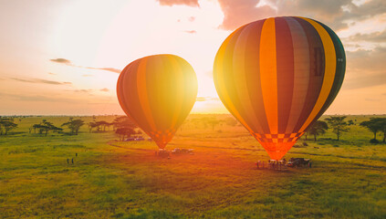 Three Miracle Balloon Safaris  in the Serengeti savannah - obrazy, fototapety, plakaty