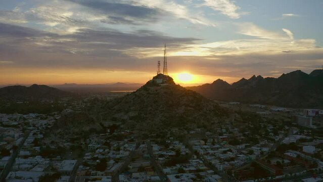 Aerial images of the Campana mountain in Hermosillo Sonora at sunset, This is the most iconic place in the city