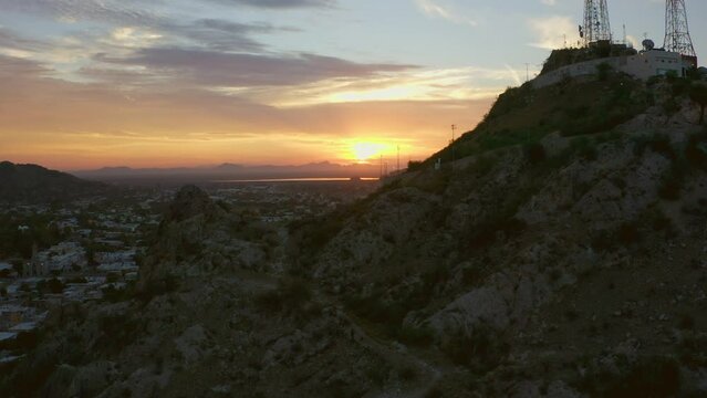 Aerial images of the Campana mountain in Hermosillo Sonora at sunset, This is the most iconic place in the city
