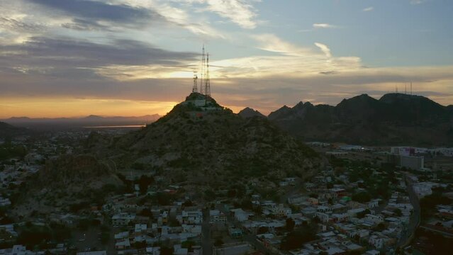 Aerial images of the Campana mountain in Hermosillo Sonora at sunset, This is the most iconic place in the city