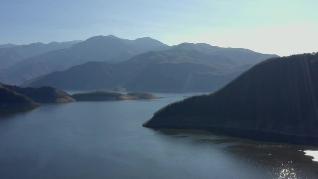 Aerial Images of a mountain range in Nayarit Mexico, named La Yesca, the drone fly over the water in this dam