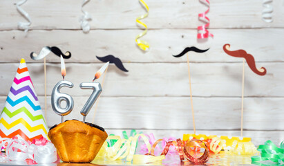 Birthday with number  67. Date of birth with number and candles, copy space. Anniversary background...
