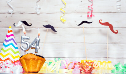 Birthday with number  54. Date of birth with number and candles, copy space. Anniversary background...