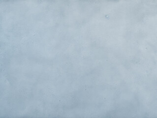 Obraz premium Man Snowboarding Down Snow Covered Slope in Winter Wilderness