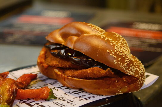 Sabich sandwich, eggplant and chicken schnitzel in challah. Tel Aviv street food.