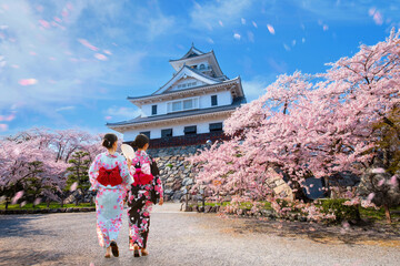 Young Japanese women in Traditional Kimono Dress at Nagahama Castle in Shiga Prefecture during full...