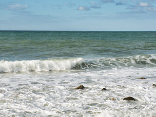 View of the Mediterranean Sea, small waves near the shore, Lido di Ostia (Rome), Italy
