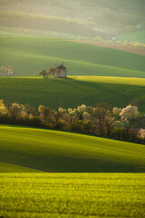 Gorgeous rural landscape with old windmill and green sunny spring hills. South Moravia region, Czech Republic
- 730961615