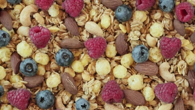 Instant Oatmeal with wild berry, Whole Grain. Bio organic dairy free. High in fibre. Granola food background rotation