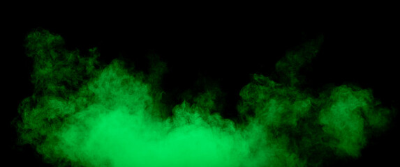 Fototapeta na wymiar Green powder dust smoke on a black background