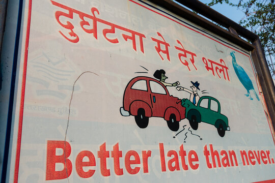 February 21st 2020 dehradun Uttarakhand, India. A warning sign board with quote in Hindi and English Language for accidents.
