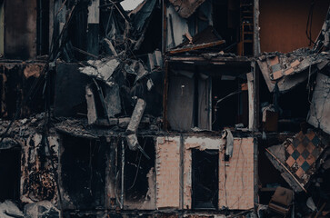 destroyed and burned houses in the city during the war in Ukraine