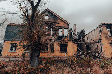destroyed and burned houses in the city during the war in Ukraine