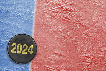 Hockey puck on red and blue ice