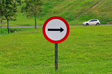 Traffic sign indicating one way in Ribeirao Preto, Sao Paulo, Brazil