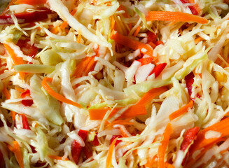 Finely chopped cabbage, carrots and peppers.