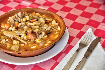 Savor an authentic Portuguese feijoada, served with generous portions of beans, meat, and sausages in a picturesque typical restaurant. An explosion of traditional Portuguese flavors.