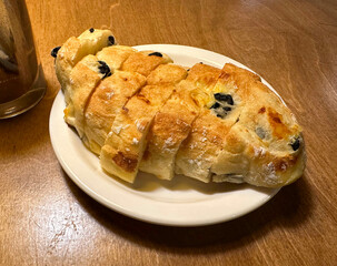 Black olive ciabatta bread in cafe