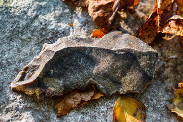 Stone Age dagger made on a flint plate and sharpened by retouching