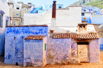 Traditional houses along alleyway in Chefchaouen, Morocco