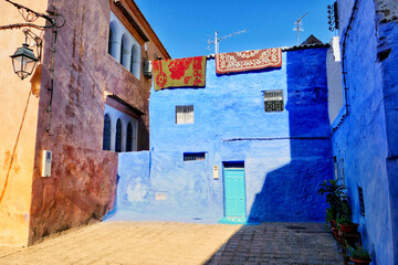 Traditional houses along alleyway in Chefchaouen, Morocco