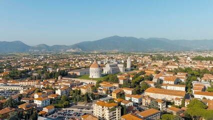 Pisa, Italy. The famous Leaning Tower and Pisa Cathedral in Piazza dei Miracoli. Summer. Evening hours, Aerial View