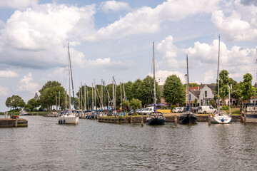 Fototapeta na wymiar Sailboats in Oosterhaven Marina, Medemblik, Noord-Holland, Netherlands