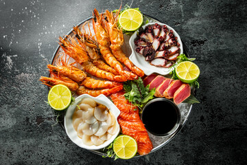 Set Seafood with salmon fish, tuna, shrimp on plate