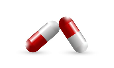 red and white pills isolated on white
