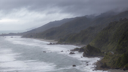 cliffs of new zealand south island in rainy day