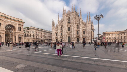 Fototapeta na wymiar Panorama showing Milan Cathedral and Vittorio Emanuele gallery timelapse.