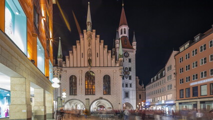 Marienplatz with the old Munich town hall and the Talburg Gate night timelapse hyperlapse, Bavaria, Germany.
