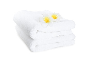 Obraz na płótnie Canvas Terry towels and plumeria flowers isolated on white