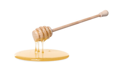 Natural honey dripping from dipper on white background