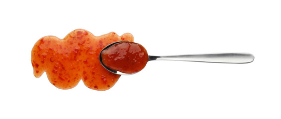 Tasty chili sauce and spoon isolated on white, top view