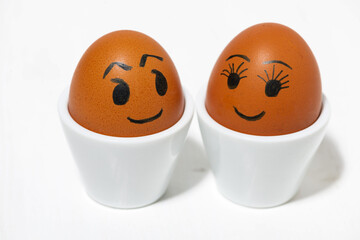 eggs, couple in love, conceptual photo on white background