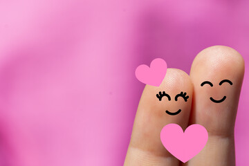 Happy finger, couple in love, Smile emoticon, Face emoticon on blurred park background.	
