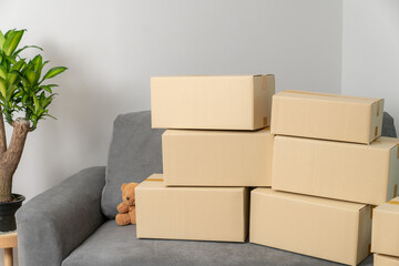 A lot of stack of cardboard boxes prepared for moving into a new home