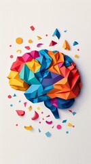An artistic paper craft illustration depicts a brain filled with multicolored geometric shapes, symbolizing a creative and imaginative mind.