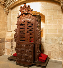 Polychrome wooden confessional or penitentiary found in the Cathedral of Zamora, Spain. Used to...