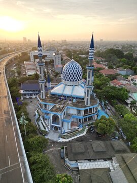Al-azhar Center Mosque panorama view Largest Mosque in Bekasi. Ramadan and Eid Concept and noise cloud when sunset or sunrise view. 