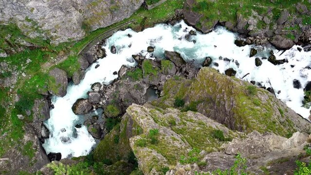 Aerial view of the deep gorge under the zipline in the canyon of Pre-Saint-Didier park, Aosta, Italy 