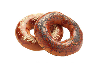 Fresh bread bagels with poppy seed isolated on white background.