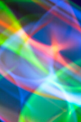 Obraz premium Abstract Neon Lights on Black Background Blurred and Moving 80s Vibe Disco