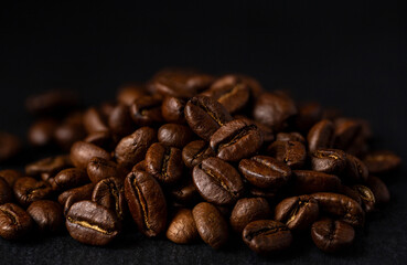 Coffee beans close up. A fragrant drink for a cheerful day