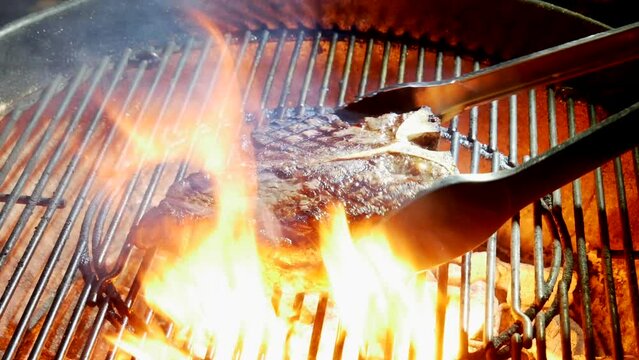 Fiorentina T-bone steak cooking on the barbecue grill