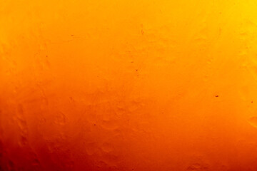 Close-up of beer glass surface,Cooled glass of beer close-up. Small water drops on cold surface of beer glass.
