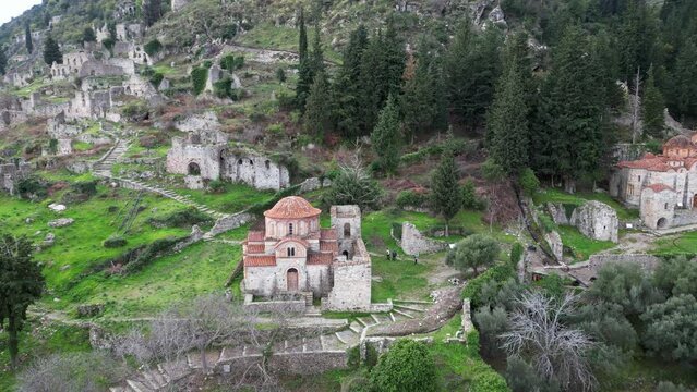 Mystras or Mistras, also known in the Chronicle of the Morea as Myzethras or Myzithras, is a fortified town and a former municipality in Laconia, Peloponnese, Greece. Ruines drone aerial view 