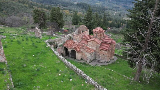 Mystras or Mistras, also known in the Chronicle of the Morea as Myzethras or Myzithras, is a fortified town and a former municipality in Laconia, Peloponnese, Greece. Ruines drone aerial view 