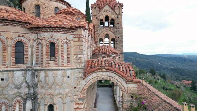 Mystras or Mistras, also known in the Chronicle of the Morea as Myzethras or Myzithras, is a fortified town and a former municipality in Laconia, Peloponnese, Greece. Ruines drone aerial view 